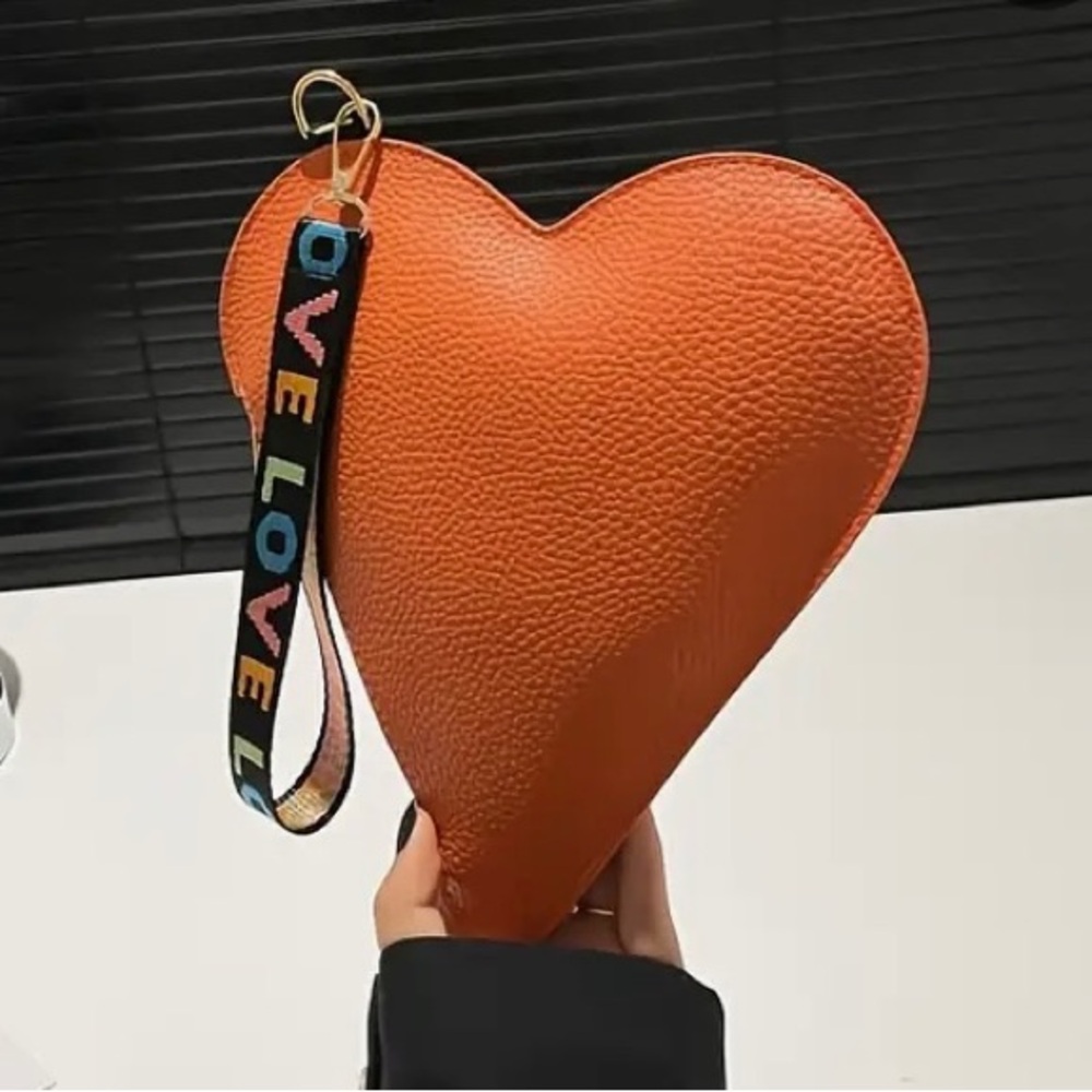 Vibrant Heart-Shaped Orange Wristlet